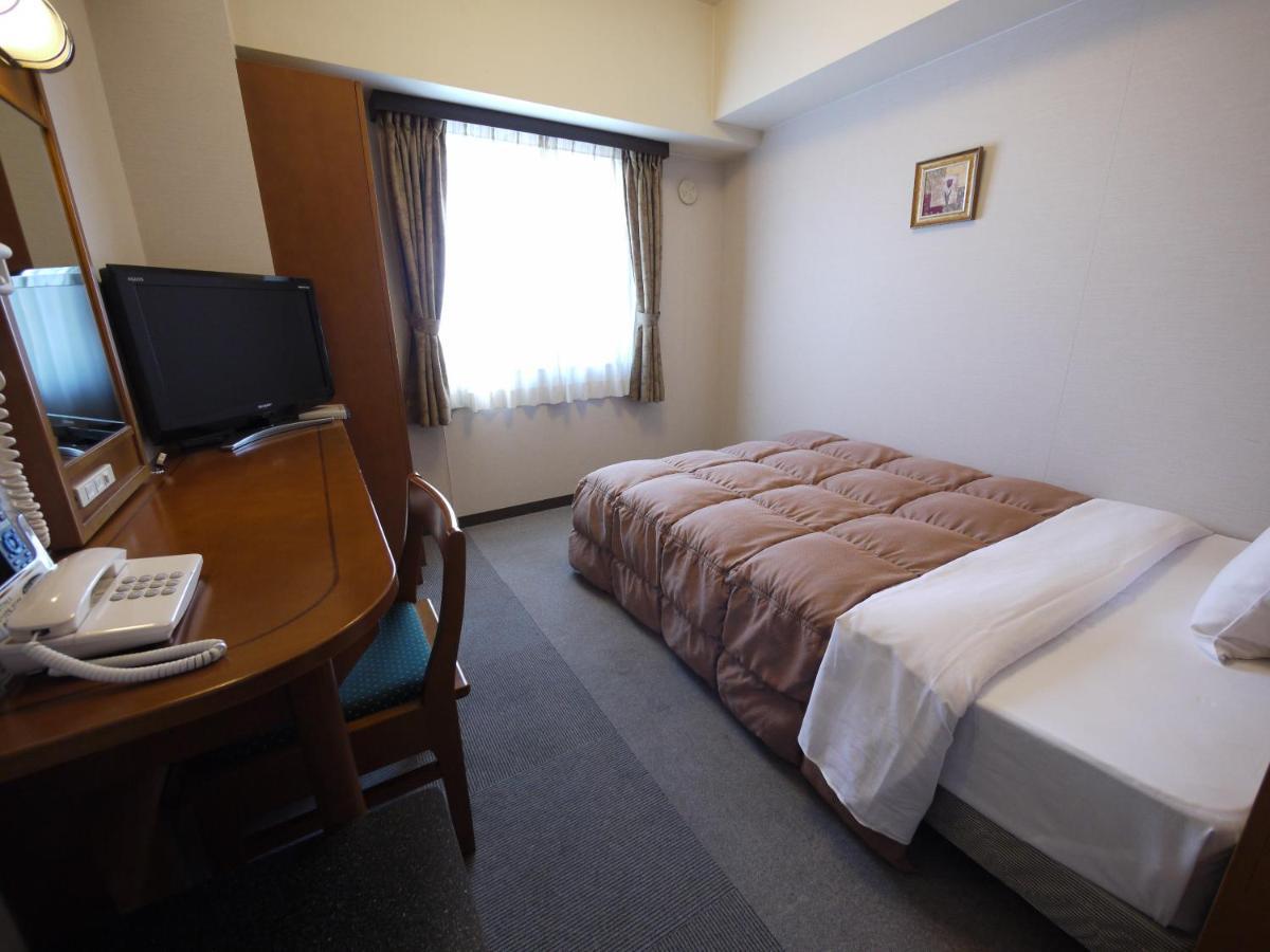 Hotel Route-Inn Matsusaka Ekihigashi Екстер'єр фото
