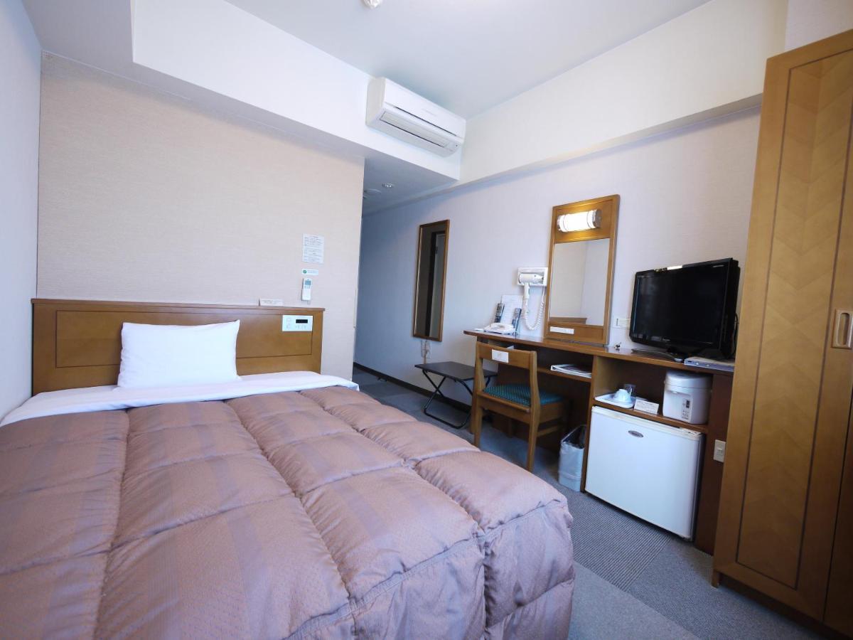 Hotel Route-Inn Matsusaka Ekihigashi Екстер'єр фото